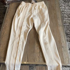 Ivy park gender neutral monogram track pants